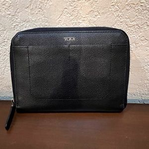 11.  TUMI Zip Wallet!